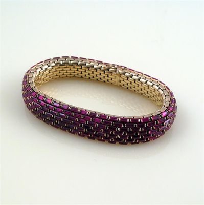 Appraisal: A synthetic ruby and gold bracelet the articulated and flexible