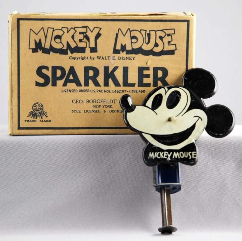 Appraisal: Walt Disney Mickey Mouse Sparkler Toy Description When plunged mouth