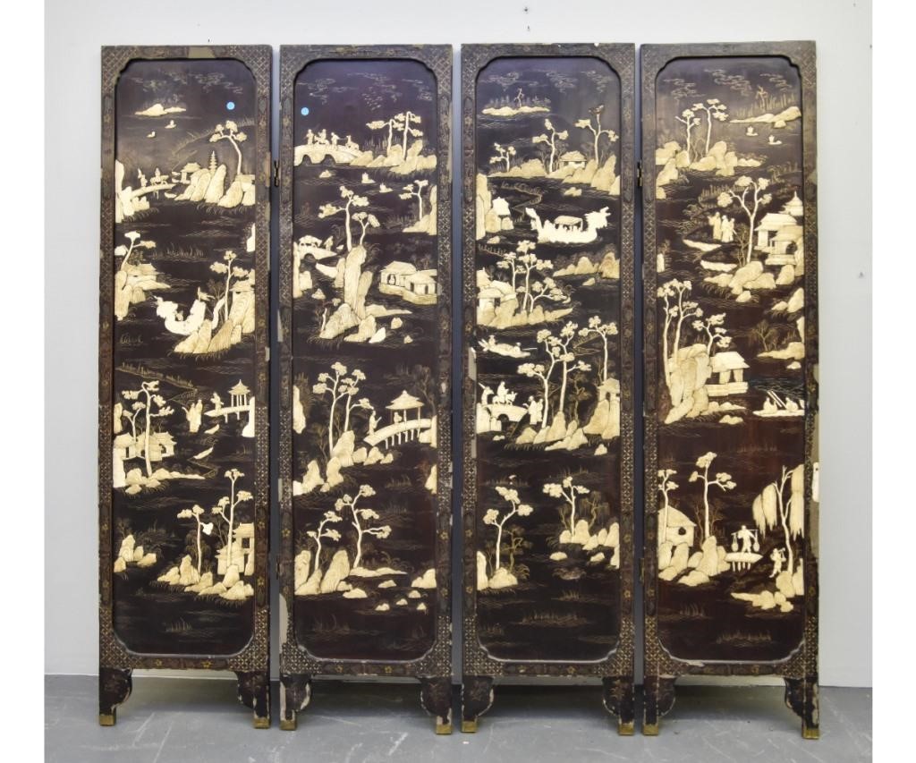 Appraisal: Chinese four panel lacquered screen with raised relief artwork probably