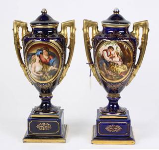 Appraisal: Pair of Royal Vienna enamel decorated covered urns each having