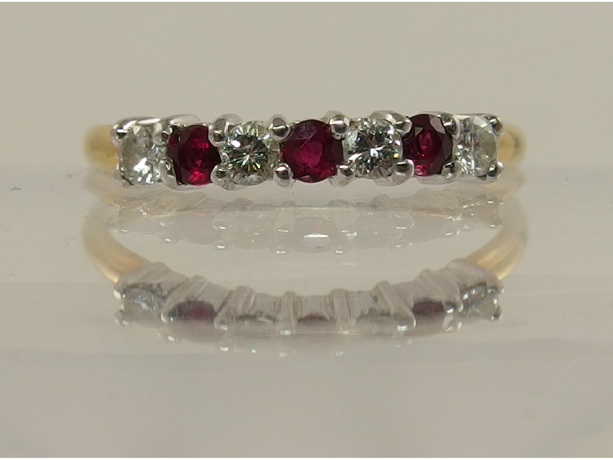 Appraisal: An ct gold ruby and diamond eternity ring