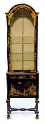 Appraisal: A CHINOISERIE DISPLAY CABINET of narrow oblong form with domed