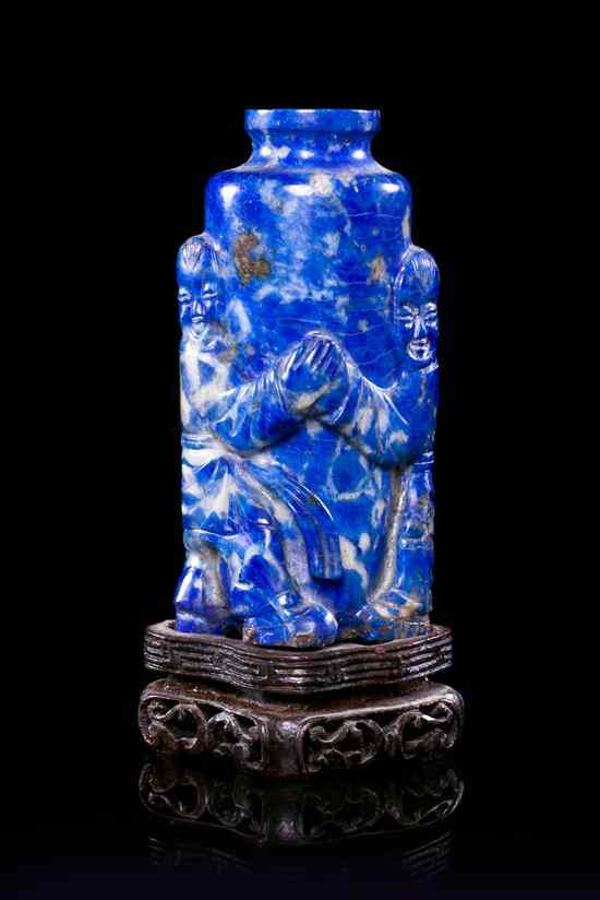 Appraisal: A Lapis Lazuli Snuff Bottle the baluster form bottle surrounded