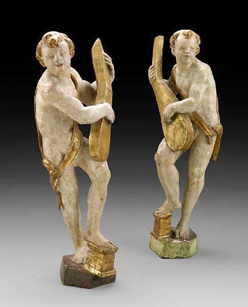 Appraisal: A pair of Northern Italian gilt and painted wood figures