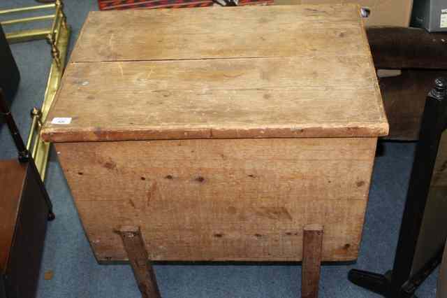 Appraisal: A VICTORIAN PINE DOUGH BIN standing on square legs wide