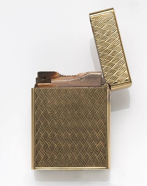 Appraisal: An k gold lighter S T Dupont Paris Mexico monogramed