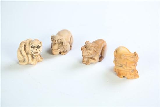 Appraisal: FOUR NETSUKES Japan th century ivory Two elephants a horse