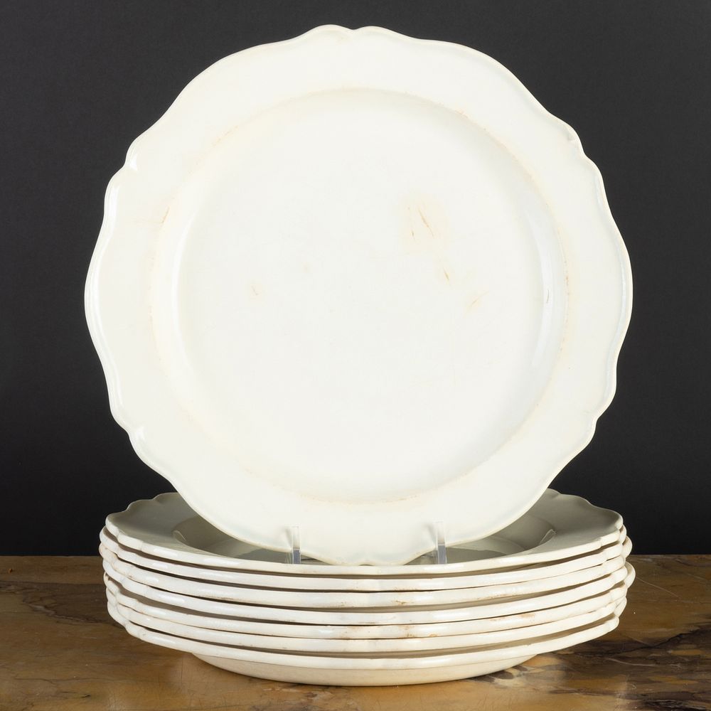 Appraisal: Group of Eight French Creamware Plates with Shaped Rims Some