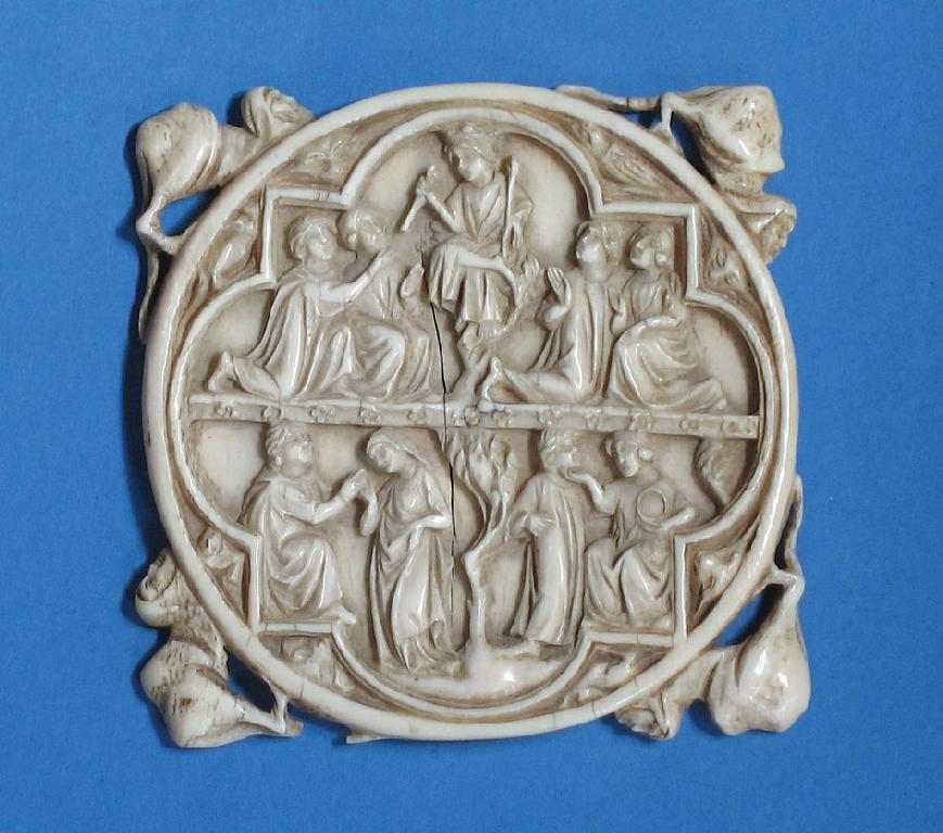 Appraisal: A GOTHIC STYLE IVORY ROUNDEL with a central panel incorporating