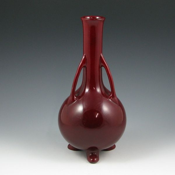 Appraisal: Three-handled Roseville Mongol footed vase in deep oxblood red glaze