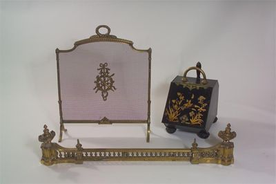 Appraisal: A French gilt brass spark guard the mesh centre applied