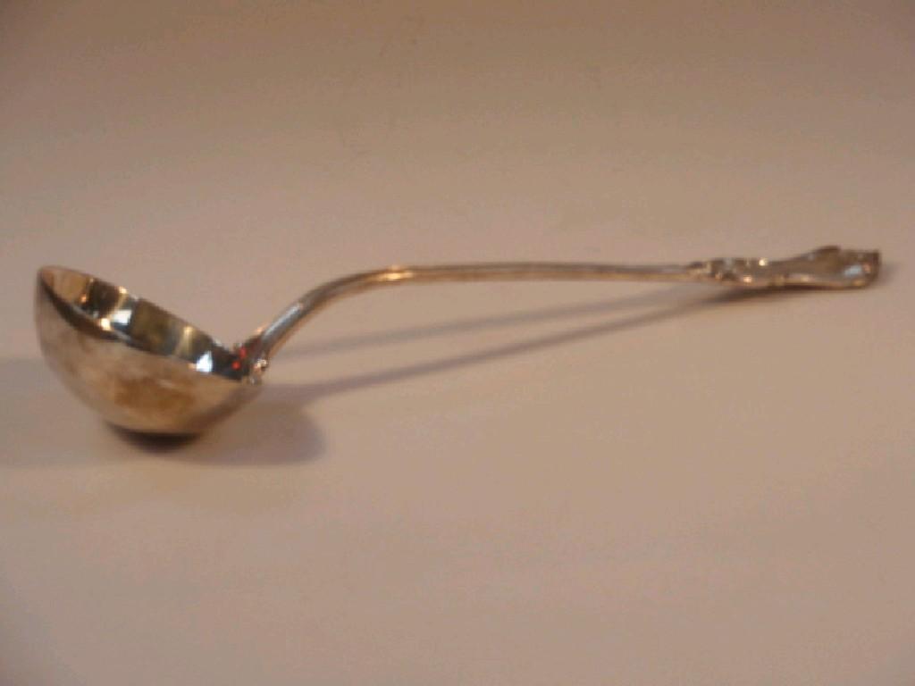 Appraisal: A Victorian silver soup or punch ladle London oz