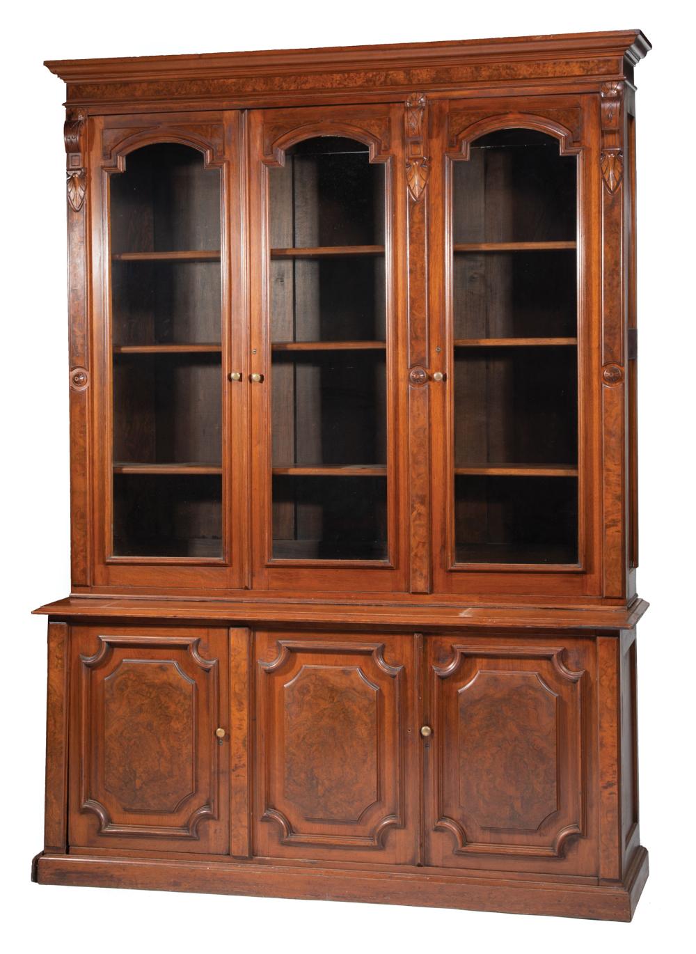 Appraisal: American Renaissance Walnut and Burl Bookcase late th c molded