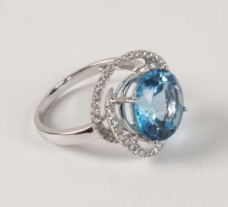 Appraisal: K WHITE GOLD DIAMOND AND BLUE TOPAZ RING K WHITE