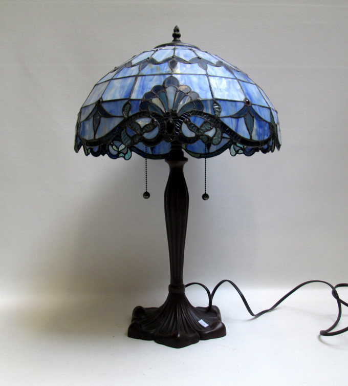 Appraisal: STAINED AND LEADED GLASS TABLE LAMP bronze colored composition flower