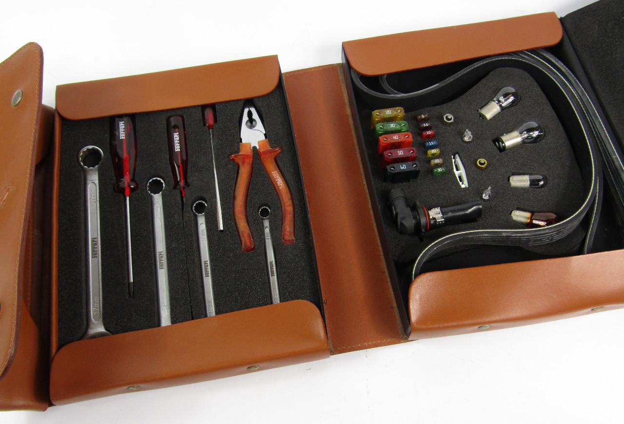 Appraisal: A 's Ferrari Moderna toolkit comprising screwdrivers spanners pliers selection