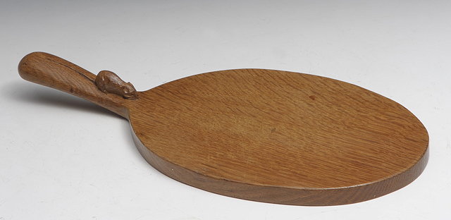 Appraisal: Robert Thompson of Kilburn British - Mouseman oak cheese boardadzedcarved