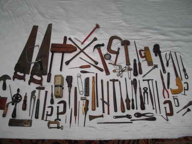 Appraisal: Box lot of assorted antique tools Includes saws level drills