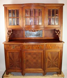 Appraisal: Art Nouveau style buffet with beveled glass Art Nouveau style