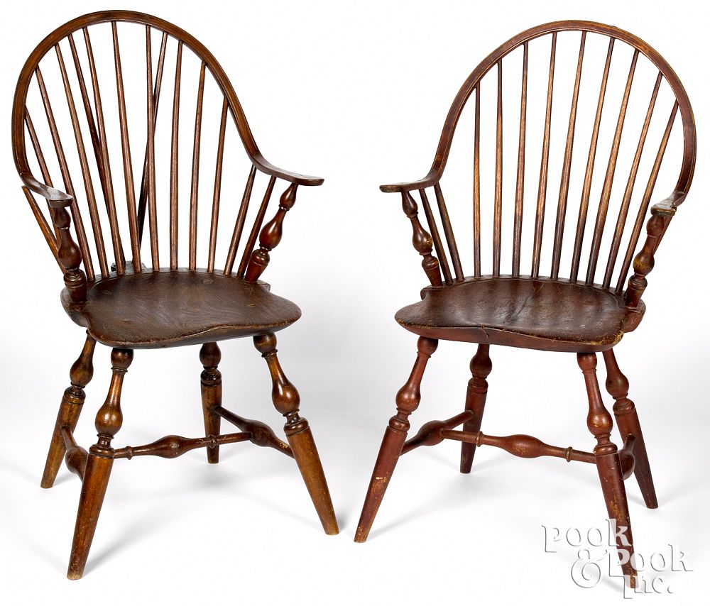 Appraisal: Two New England continuous arm Windsor chairs Two similar New