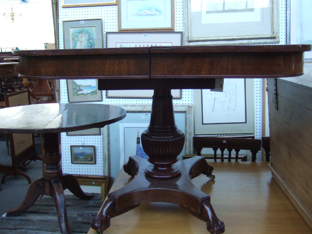 Appraisal: An th century Italian mahogany extending dining table the rectangular