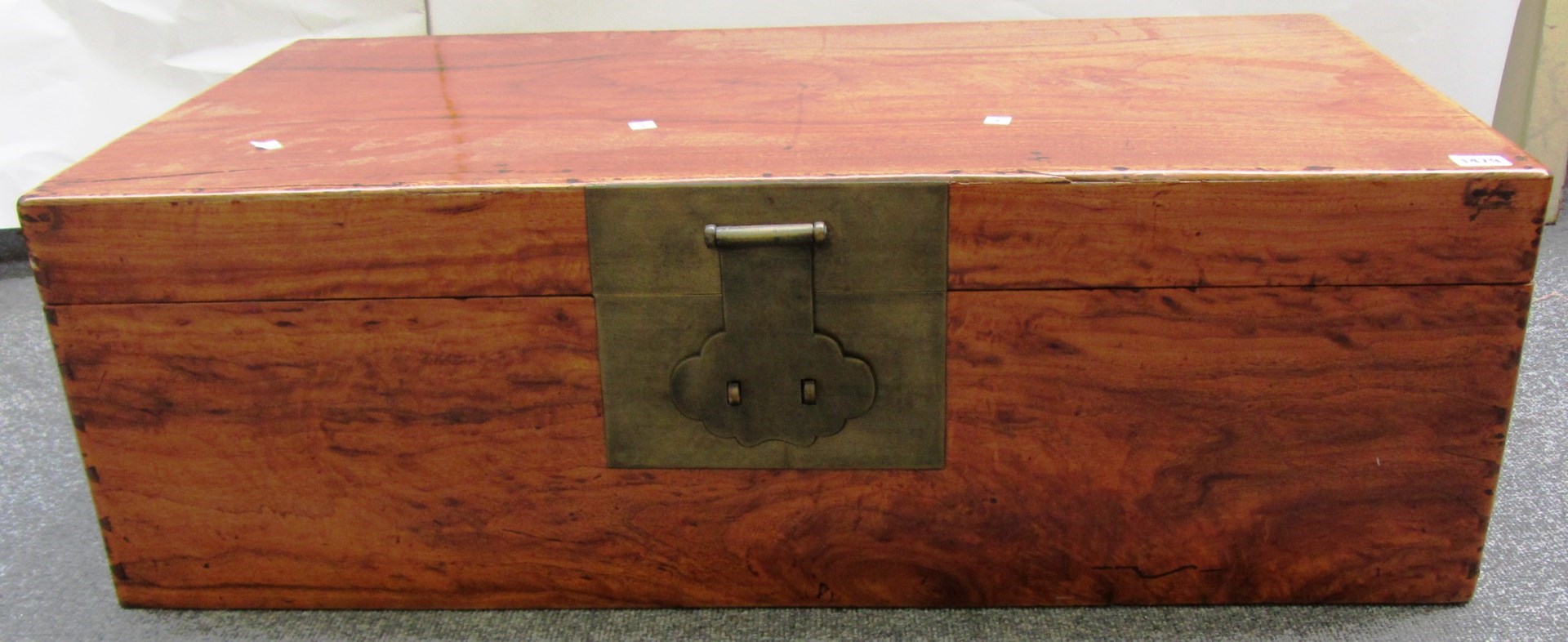 Appraisal: A th century Chinese rectangular camphorwood trunk with brass lock