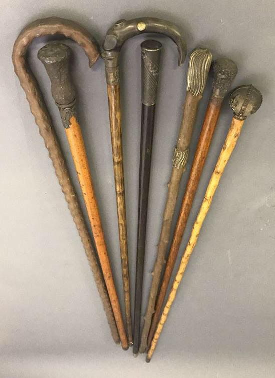 Appraisal: Seven Walking Sticks Seven walking sticks with metal handles one