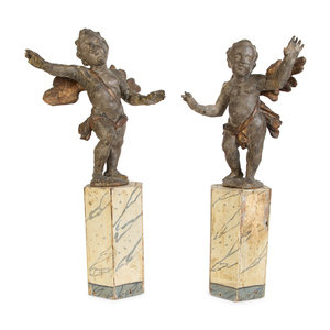 Appraisal: A Pair of Italian Carved Putti on Painted Faux-Marble Bases