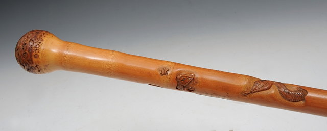 Appraisal: A JAPANESE BAMBOO WALKING CANE carved with a toad and