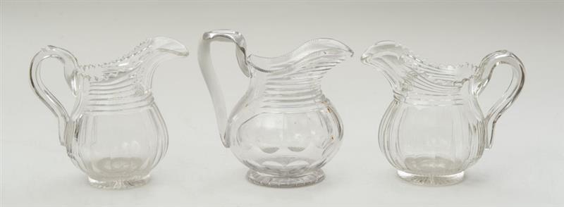 Appraisal: THREE SIMILAR ANGLO-IRISH CUT CRYSTAL PITCHERS in in and in