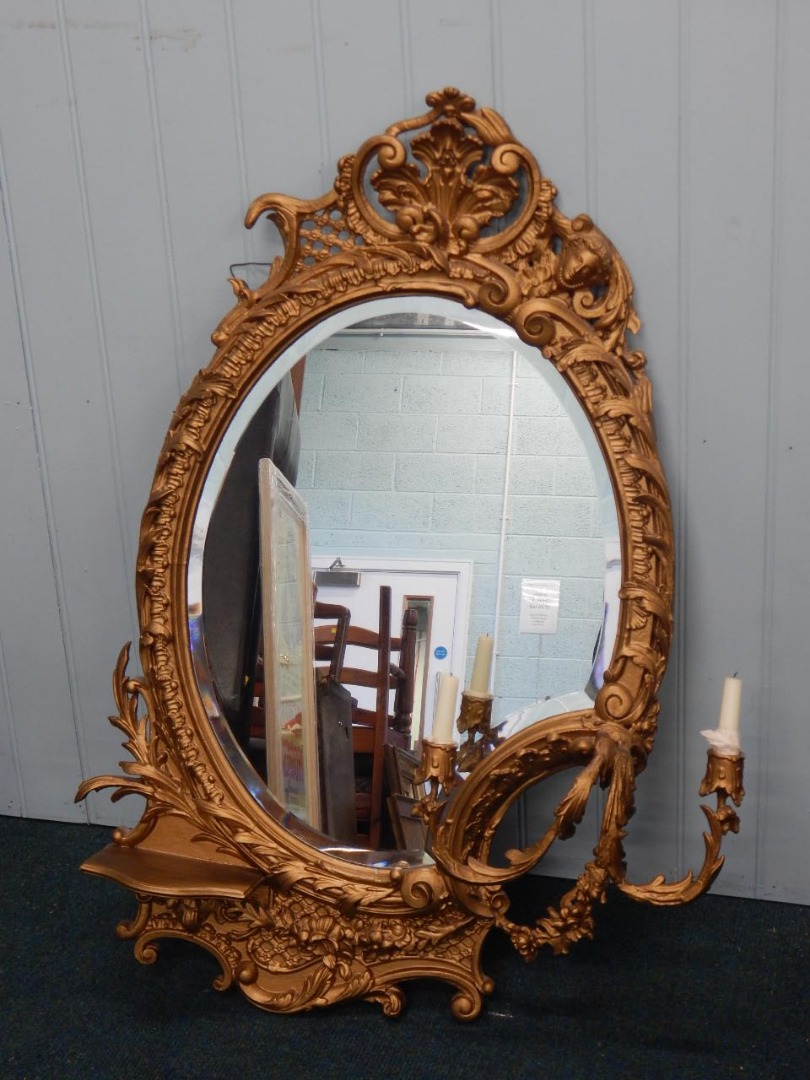 Appraisal: A late thC gilt gesso girandole with a shaped bevelled