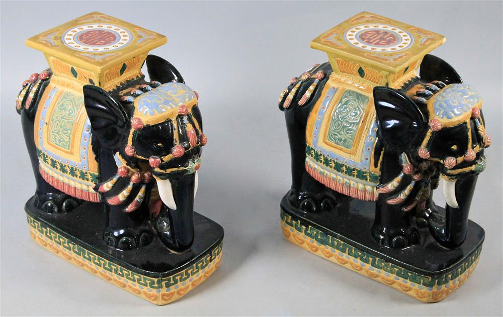 Appraisal: PAIR OF GLAZED CERAMIC ELEPHANT GARDEN SEATS with yellow and