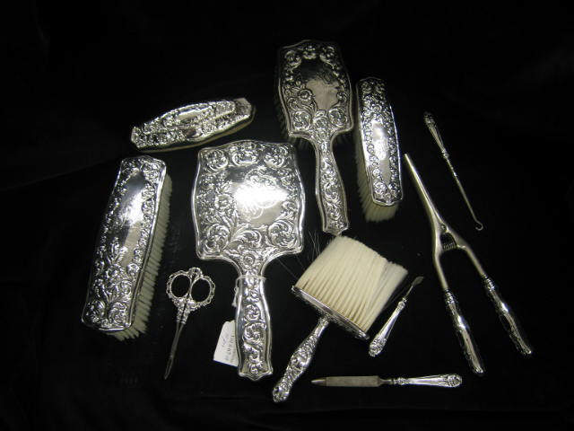 Appraisal: pc Victorian Sterling Silver Dresser Set fancy floral includes mirror