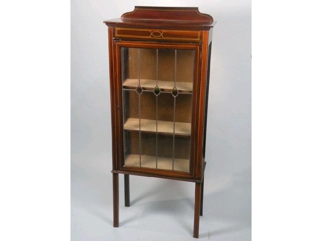 Appraisal: An Edwardian mahogany display cabinet with painted simulated line inlaid