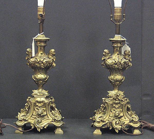 Appraisal: A pair of R gence style bronze chenets late th