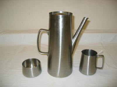 Appraisal: A THREE PIECE STAINLESS STEEL COFFEE SET by Robert Welch