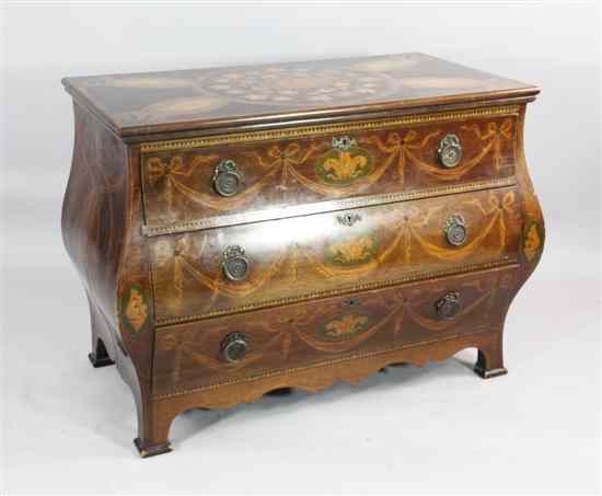 Appraisal: A late th century marquetry inlaid mahogany bombe chest of