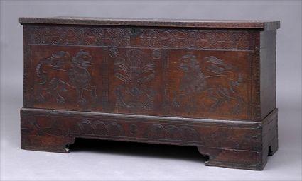 Appraisal: CONTINENTAL BAROQUE-STYLE INCISED WALNUT CASSONE ON STAND The hinged top