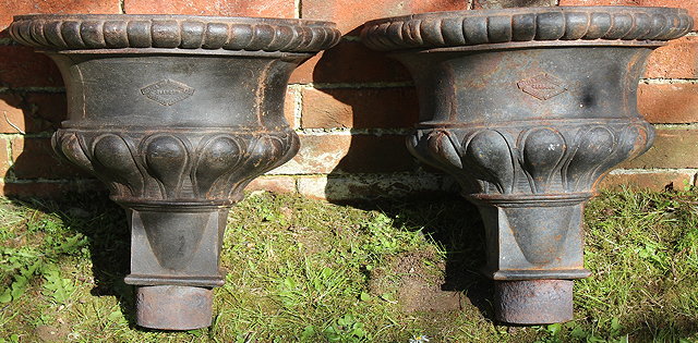 Appraisal: A PAIR OF VICTORIAN CAST IRON 'D' SHAPED RAIN WATER