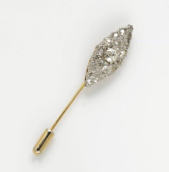 Appraisal: A diamond platinum-topped and eighteen karat gold navette-shape stick pin