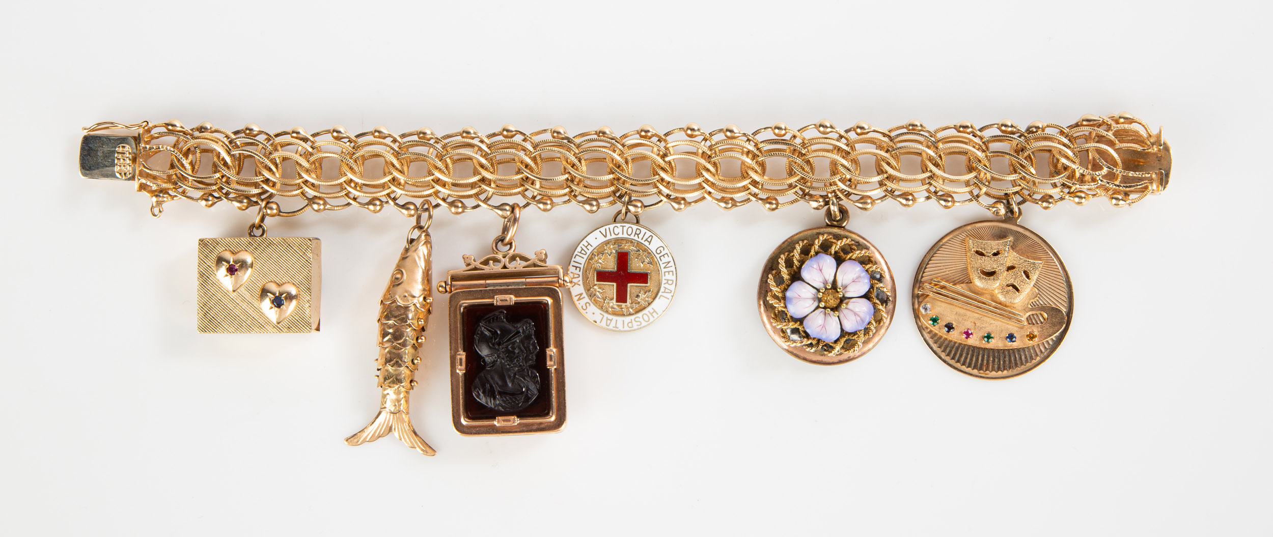 Appraisal: K GOLD CHARM BRACELET Charms are between - K g