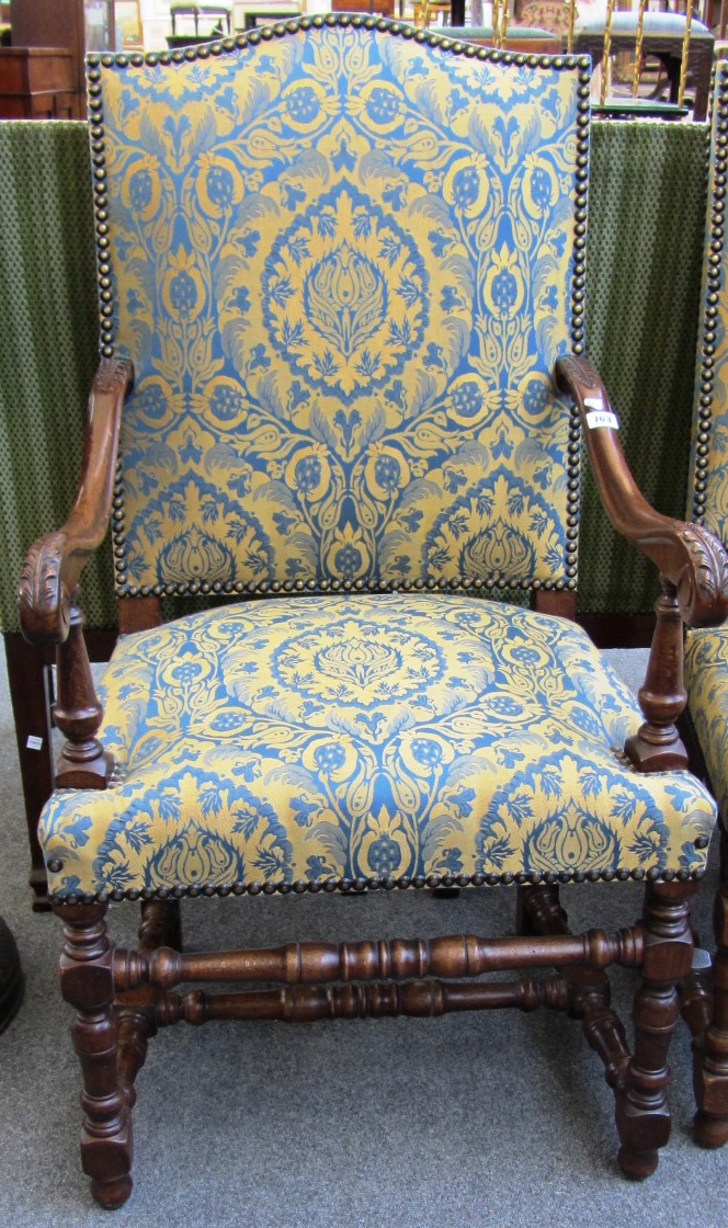 Appraisal: A set of four stained beech side chairs with hump