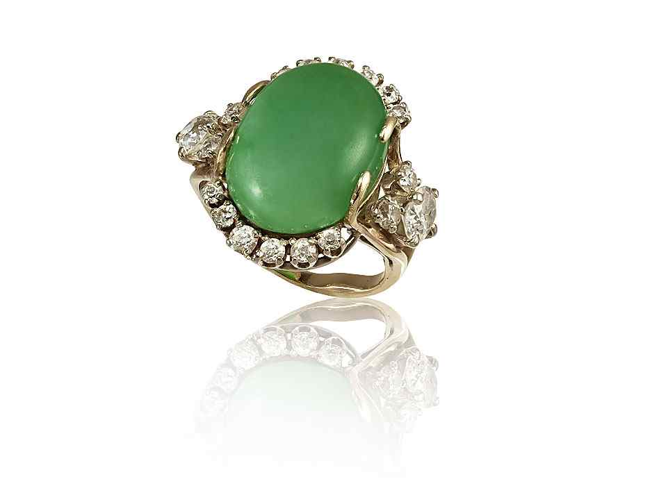 Appraisal: JADE DIAMOND RING K yellow gold ring centers one x