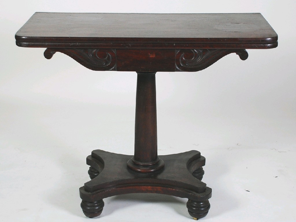 Appraisal: NINETEENTH CENTURY MAHOGANY FOLD-OVER PEDESTAL TEA TABLE the moulded oblong