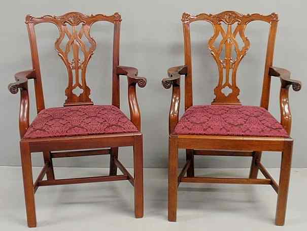 Appraisal: Pair of Chippendale style mahogany open armchairs by Baker Furniture