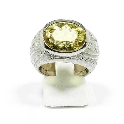 Appraisal: BERYL AND DIAMOND RING White gold g Decorative slightly convex