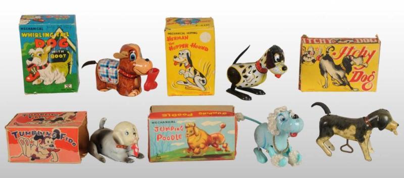 Appraisal: Lot of Dog Wind-Up Toys Description Japanese Working Includes original