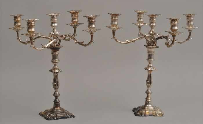 Appraisal: PAIR OF ELKINGTON SILVERPLATE FIVE-LIGHT CANDELABRA In the George II