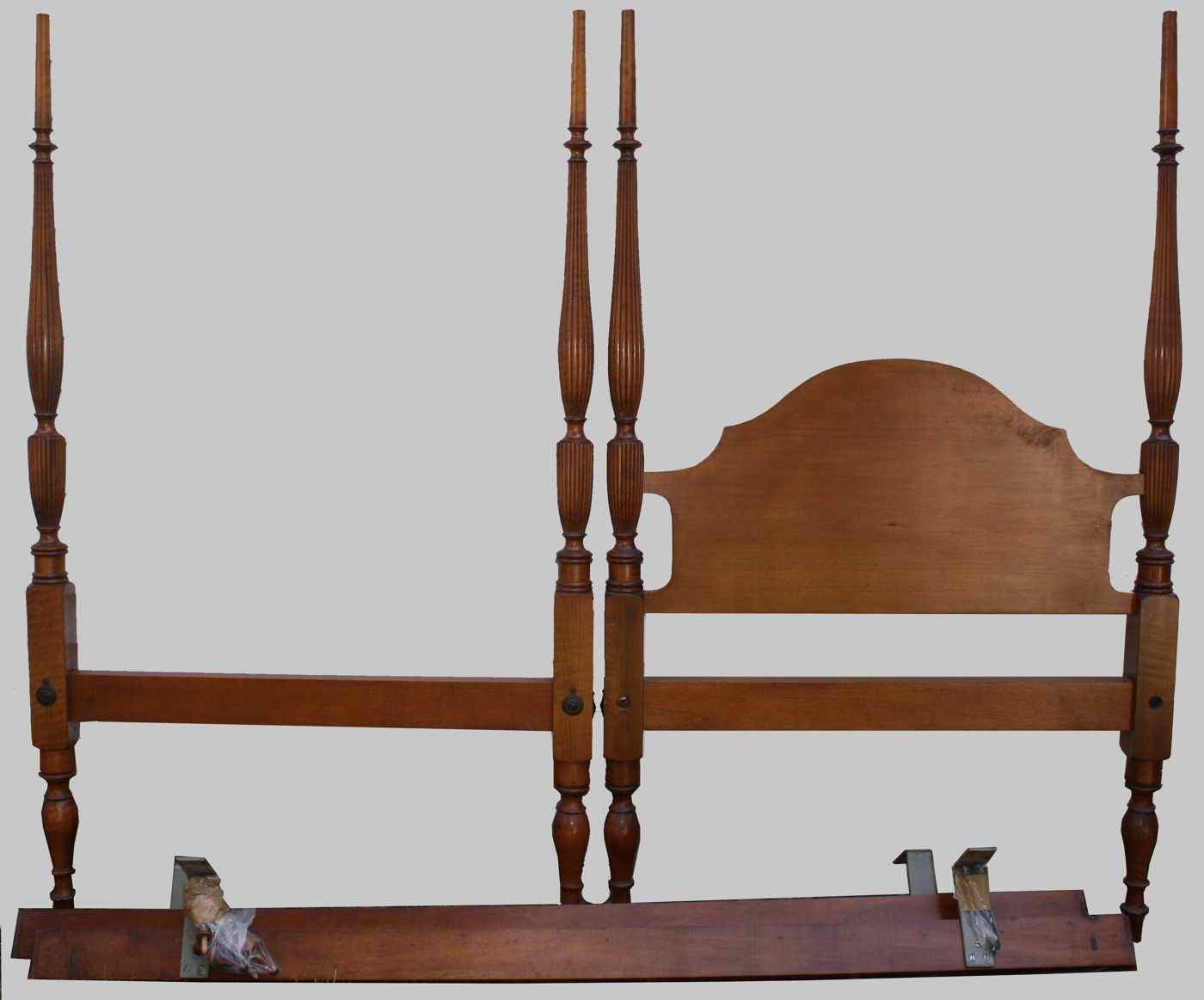 Appraisal: PAIR OF SHERATON-STYLE FOUR-POST TWIN BEDS th CenturyIn light mahogany