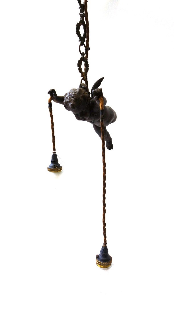 Appraisal: Four patinated spelter cherubic figural ceiling lights early th century